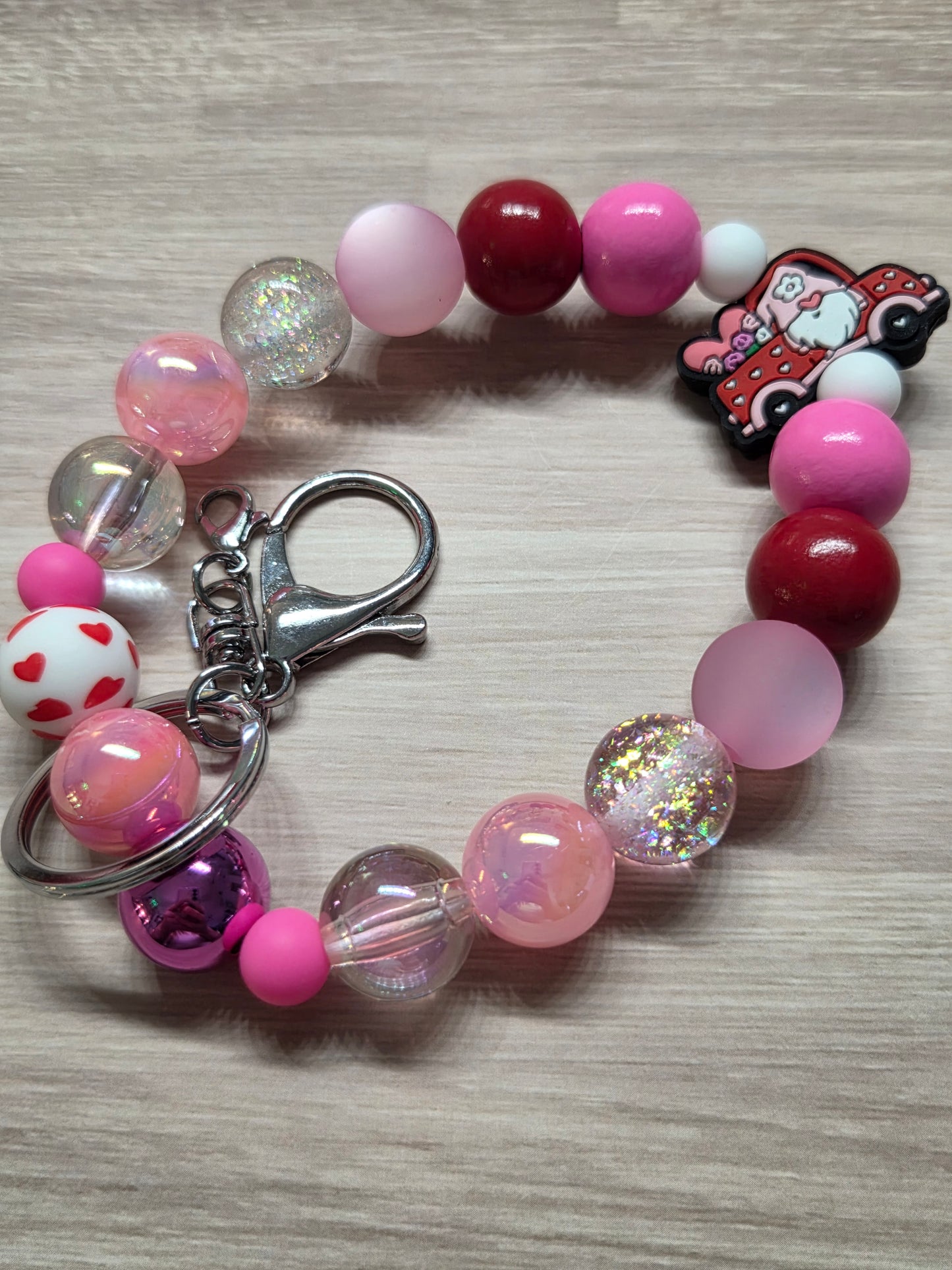 Valentine's Day - Wristlet - Gnome Driving Truck Filled with Hearts, silver Keyring & Lobster Claw, multiple Beautiful Beads in Various shades of pinks, glitters, & reds