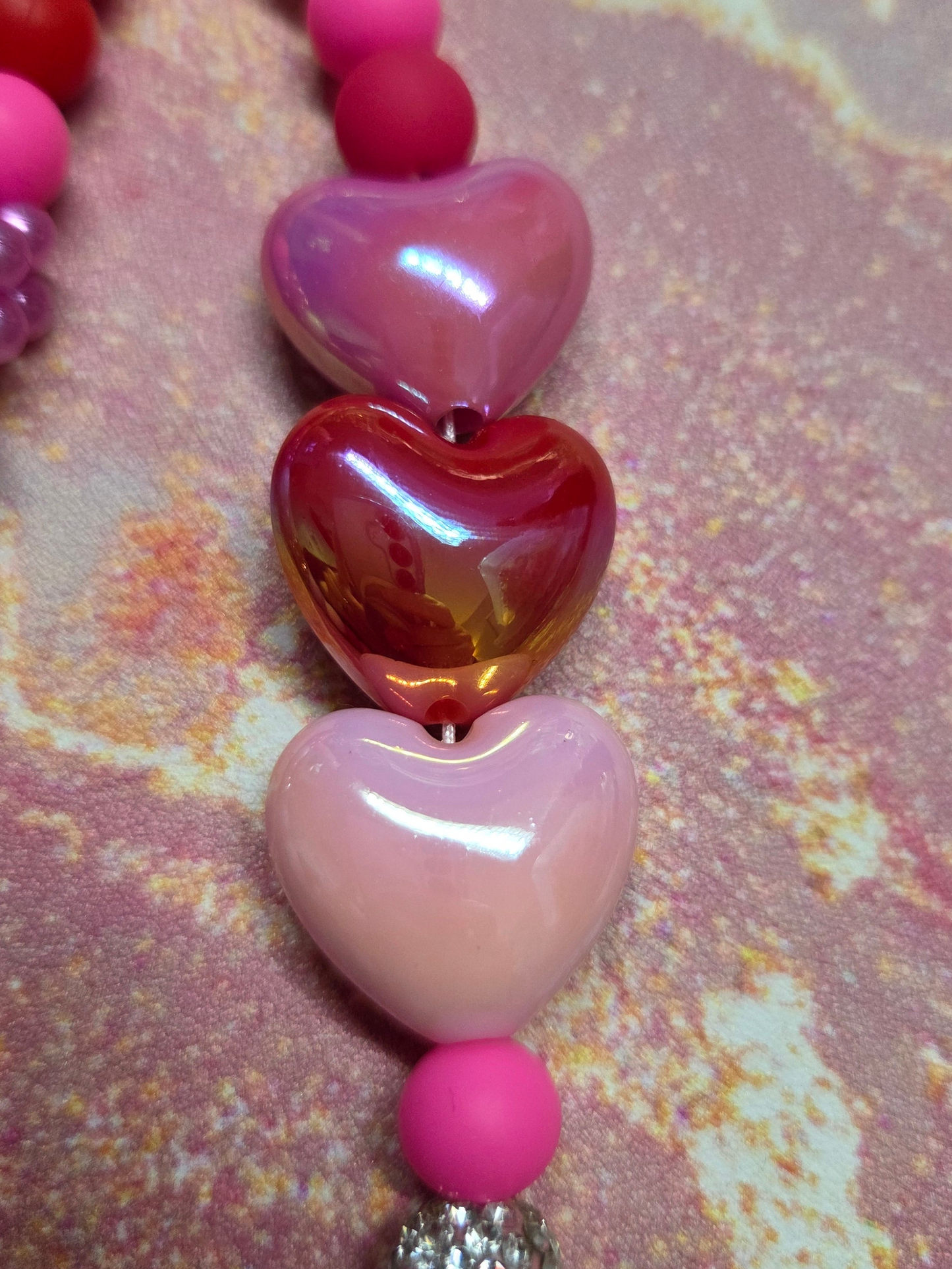 A Pocket Full of Hearts 💕- Phone Charm- if you love pinks, reds, rhinestones, & hearts, this is the one for you! Carabiner Topper
