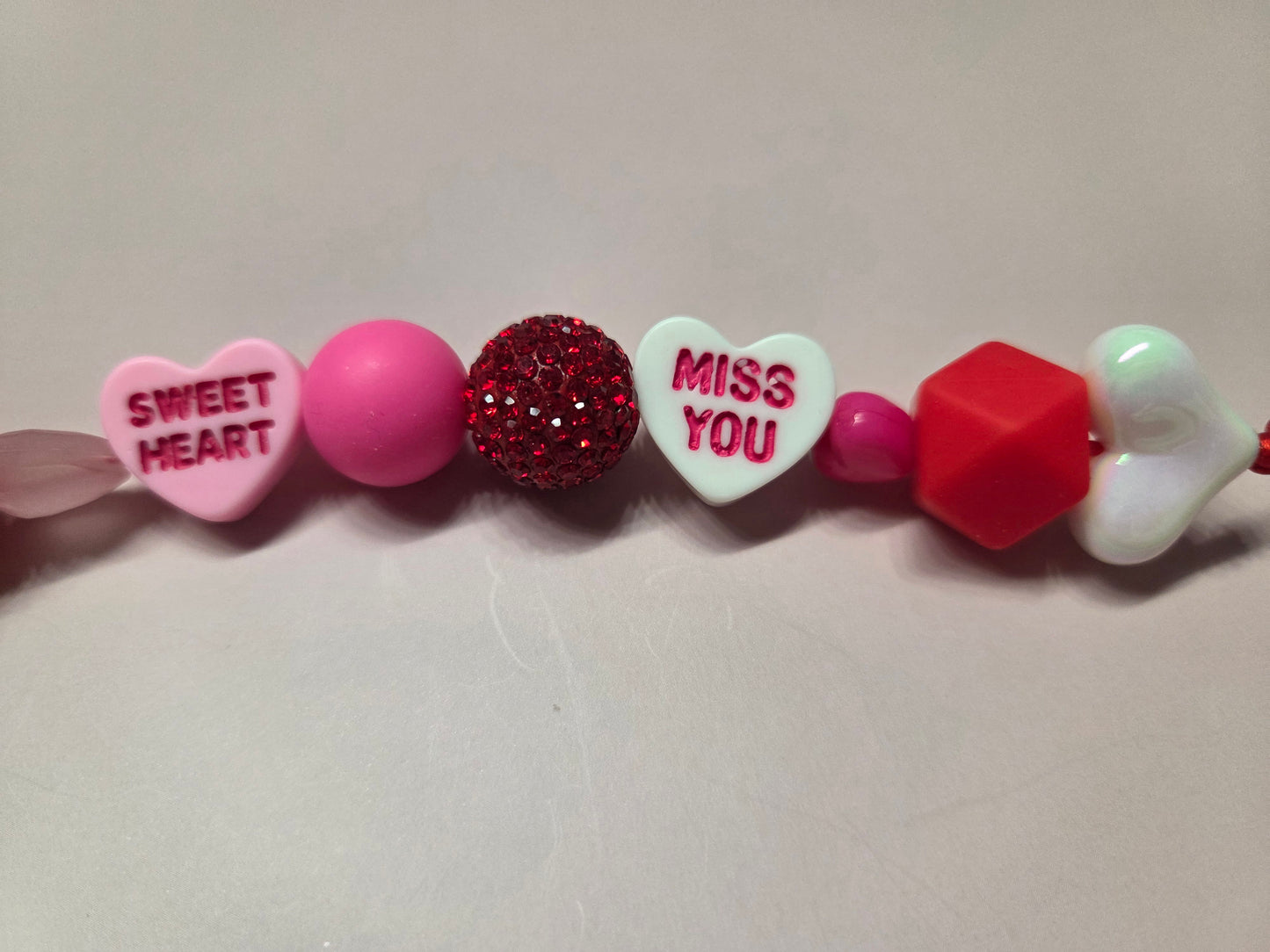 Valentine's Day Keychain/Purse Charm - Sweet Little Gnome Holding a Heart stating "Love" Wearing a Red Hat Covered in White Hearts feat Candy Phrase Heart Beads as Accent - Adorable!