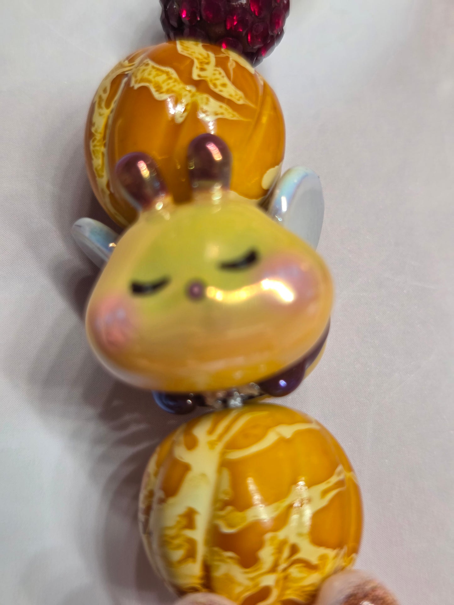 Phone Charm - HK in her adorable Bumblebee Costume while a little Bee follows her around with her honey beads!