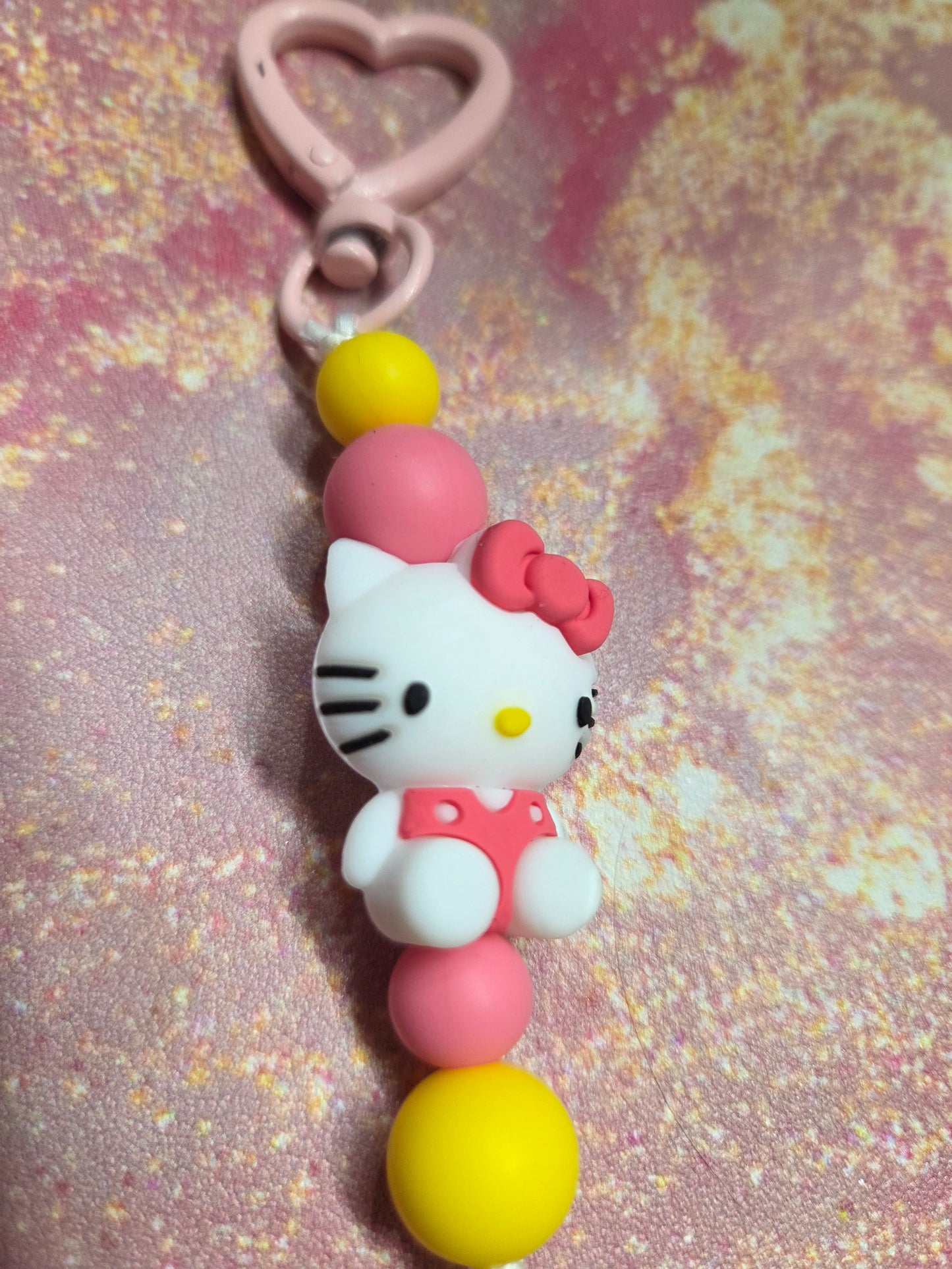 Small Hello Kitty Keychain/Purse Charm on a Pink Heart Shaped Caribiner