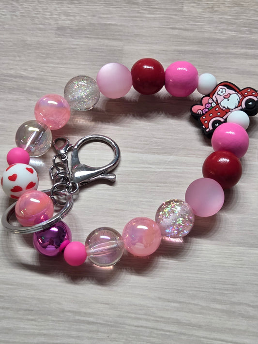 Valentine's Day - Wristlet - Gnome Driving Truck Filled with Hearts, silver Keyring & Lobster Claw, multiple Beautiful Beads in Various shades of pinks, glitters, & reds