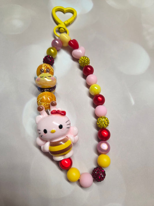 Phone Charm - HK in her adorable Bumblebee Costume while a little Bee follows her around with her honey beads!