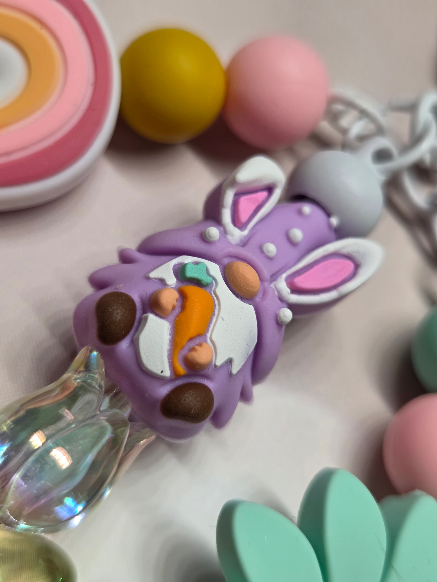 Easter - 3 Strand Keychain/Purse Charm - Easter Gnome Holding a Carrot & Sitting on a Tulip, Large Pastel Green Flower, & Cute Little Rainbow