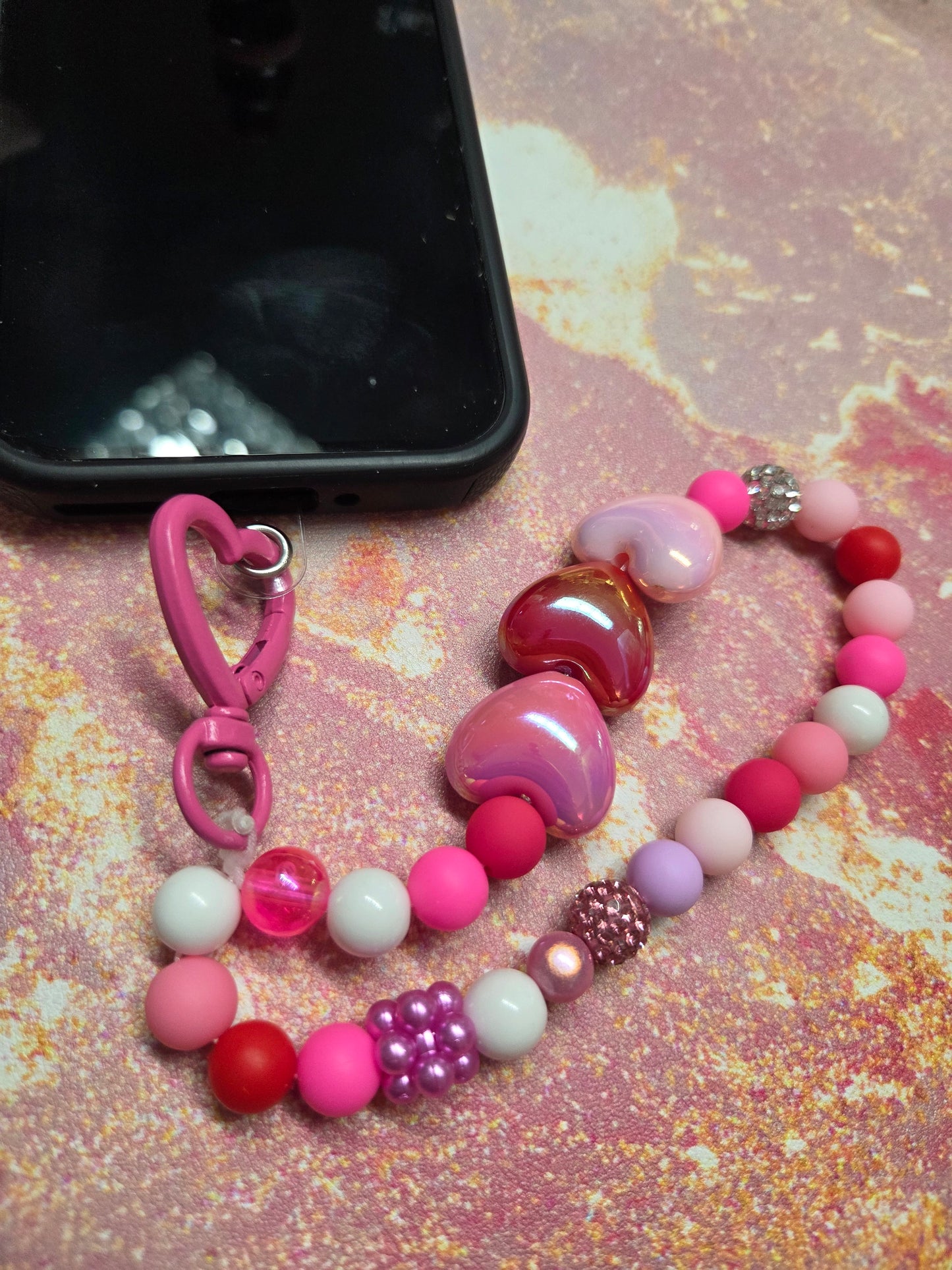 A Pocket Full of Hearts 💕- Phone Charm- if you love pinks, reds, rhinestones, & hearts, this is the one for you! Carabiner Topper